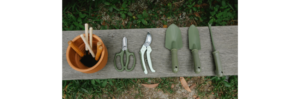 a group of garden tools on a bench